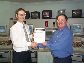 Clinton Rodda (Sage) and Sandy Drummond (Energy Brix) shake on a safer tomorrow